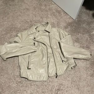 Tan faux leather jacket. Good condition.